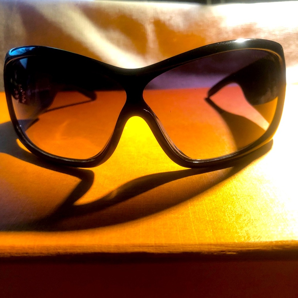 ARMANI EXCHANGE wraparound sunglasses.